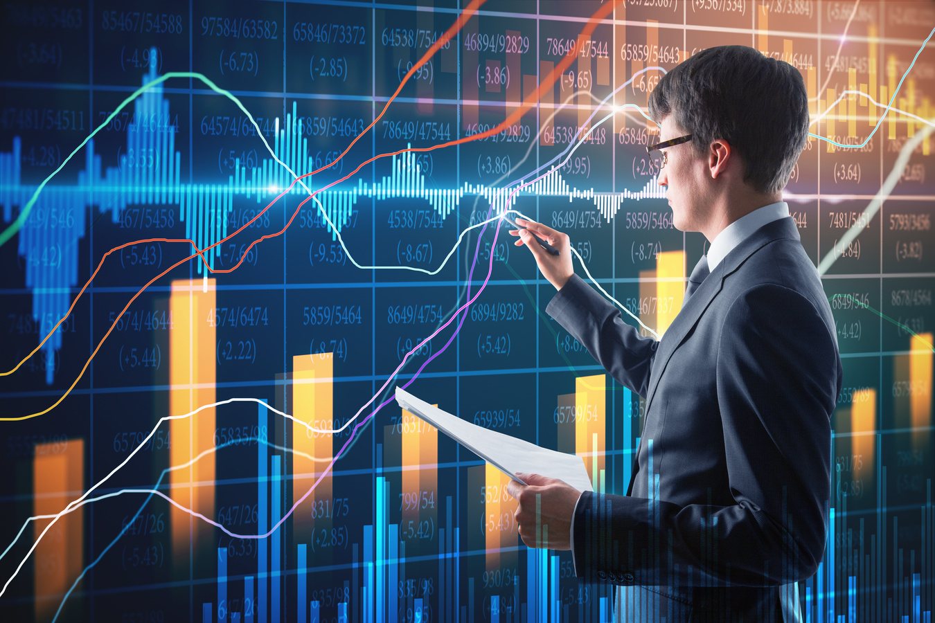 Attractive businessman with forex chart